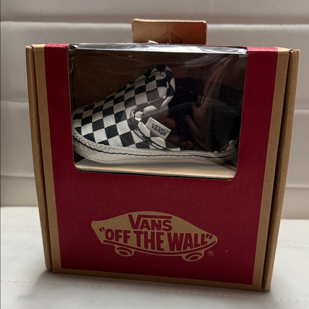 Vans Black and White Checkered Slip-Ons